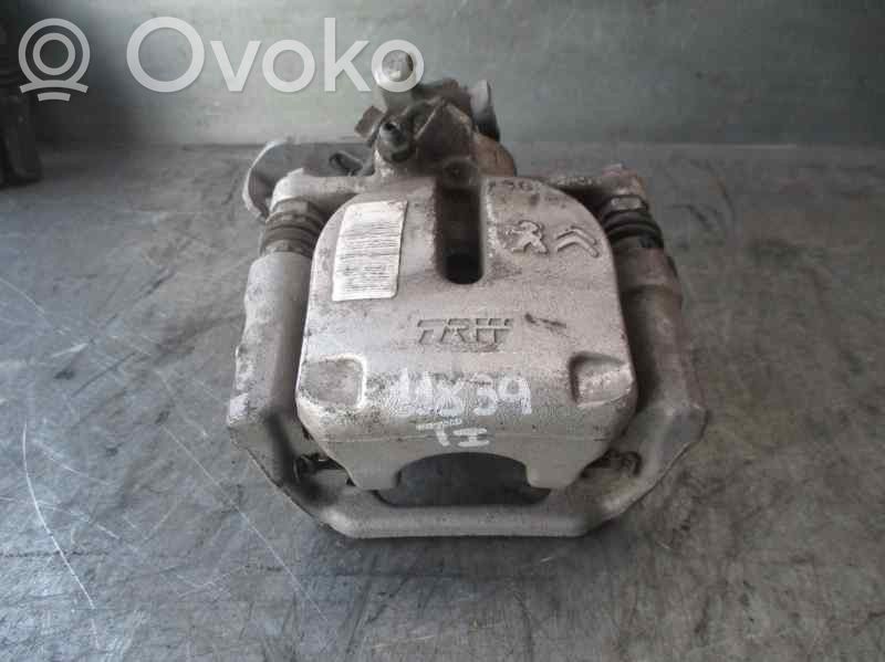 Opel Combo E Caliper del freno trasero 
