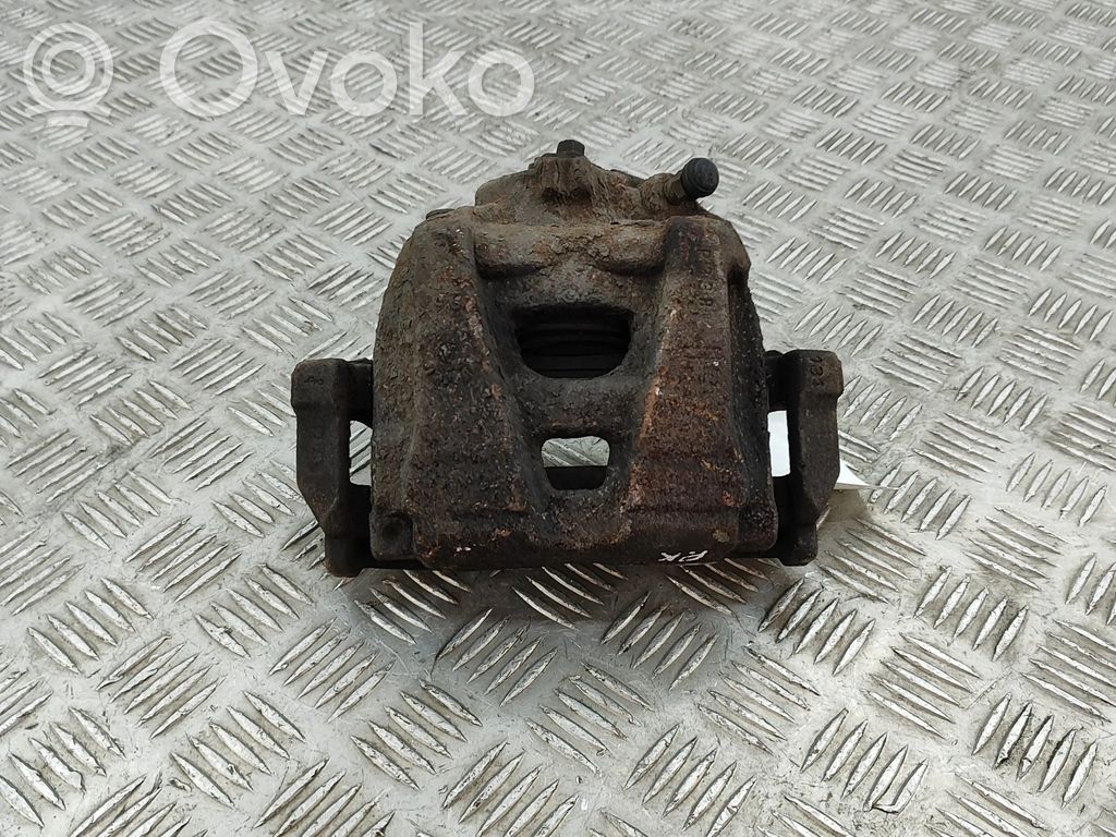Audi Q3 8U Zacisk hamulcowy przedni 