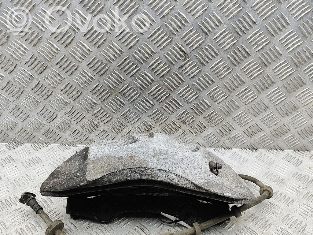 Audi Q7 4M Zacisk hamulcowy przedni 