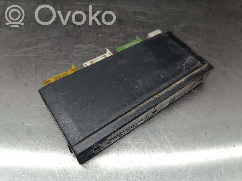BMW 5 E34 Komforto modulis 