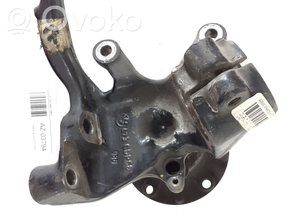 Front wheel hub spindle knuckle