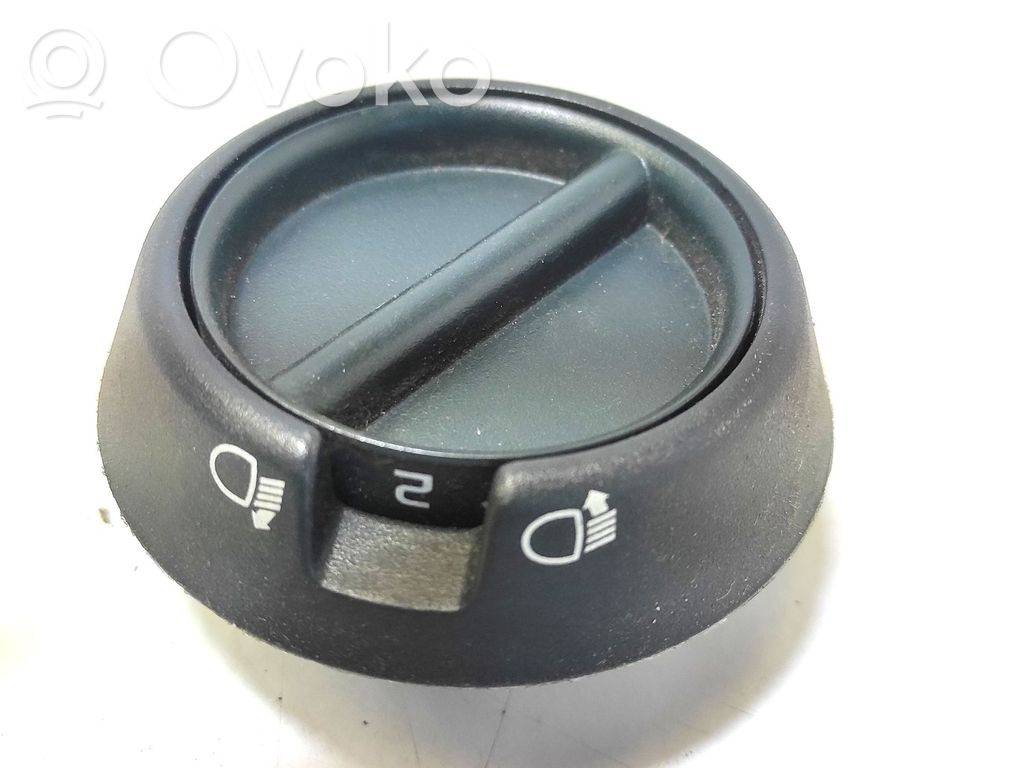 Headlight level height control switch   7700308729