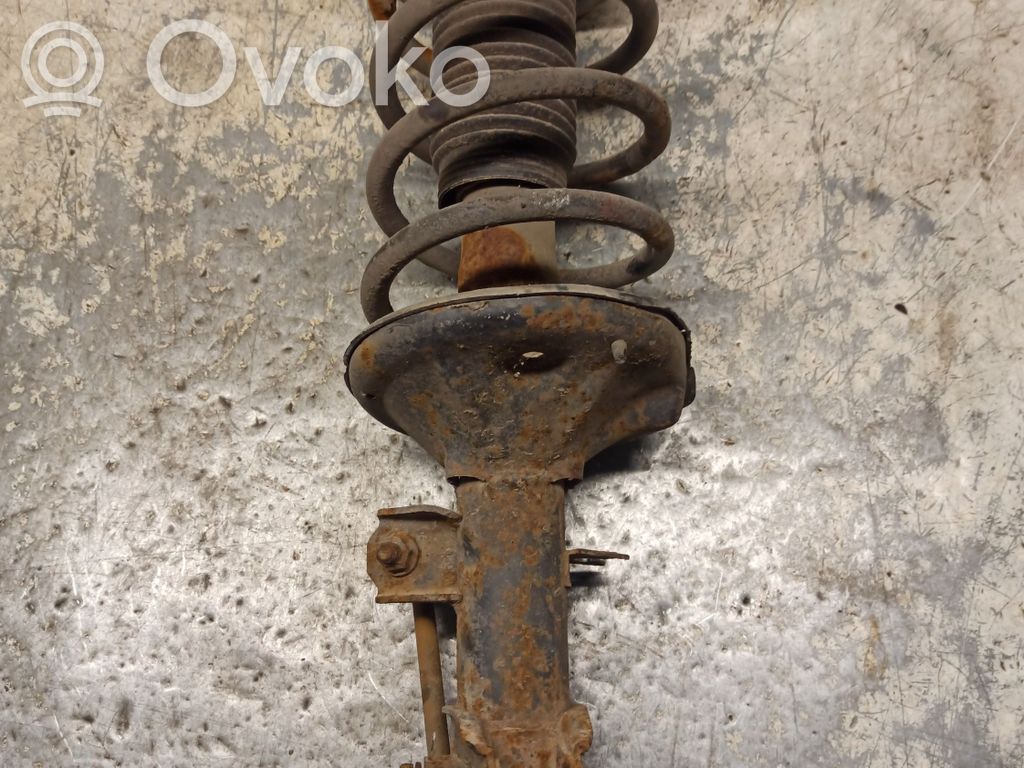 Front shock absorber with coil spring