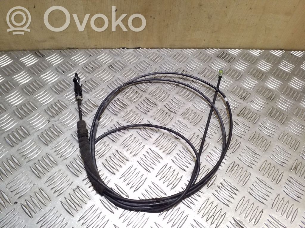 Fuel cap flap release cable