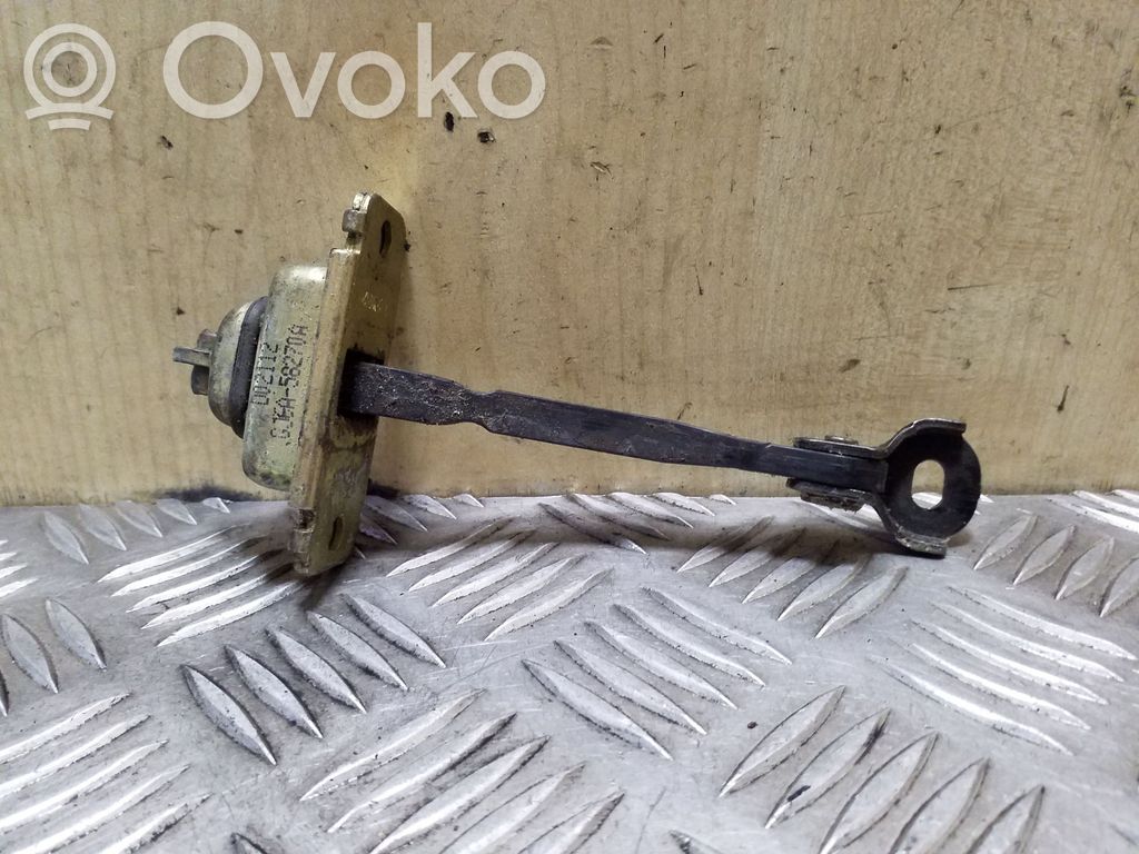 Mazda 6 Takaoven pidätin 