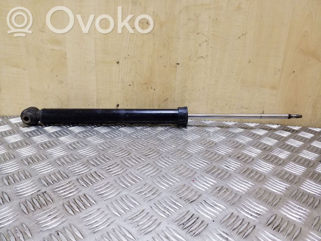 Opel Corsa D Aizmugurē amortizators 