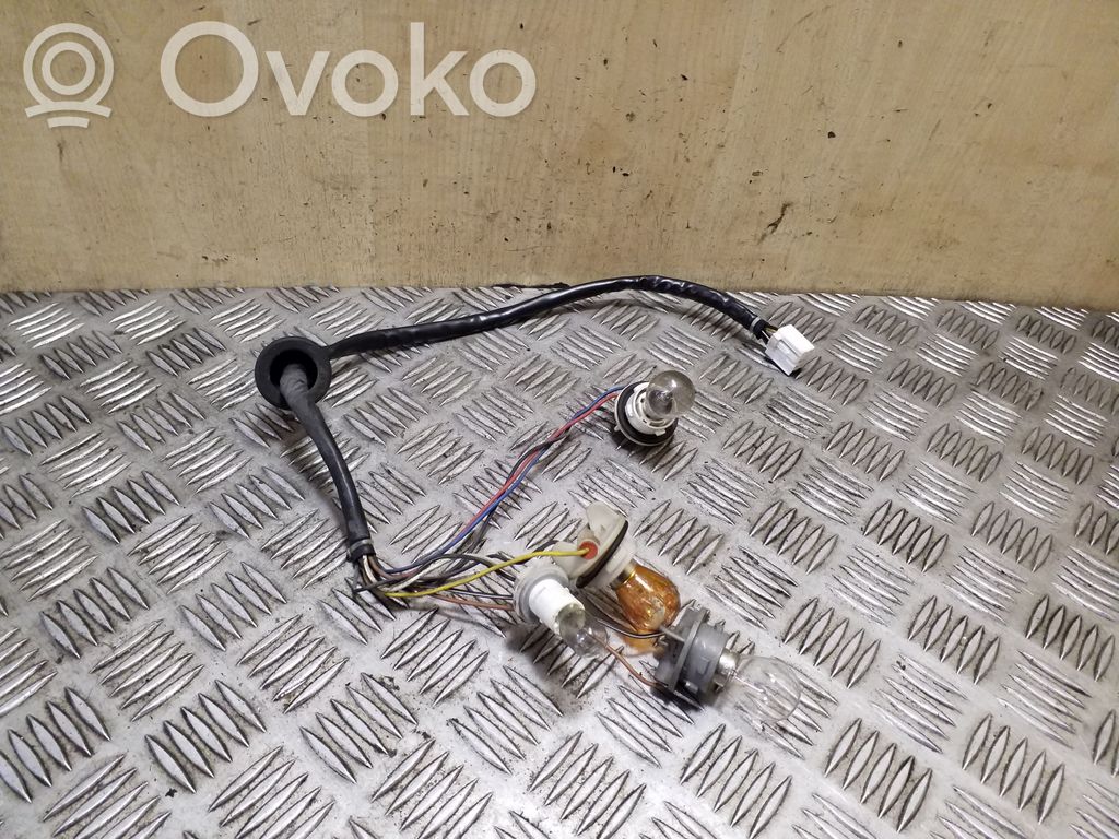 Chevrolet Captiva Takavalon polttimon suojan pidike 