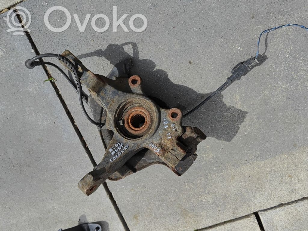 Opel Corsa D Zwrotnica koła przedniego 