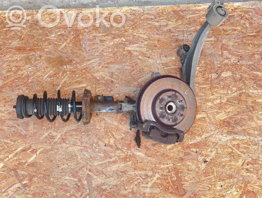 Opel Astra J Zwrotnica koła przedniego 