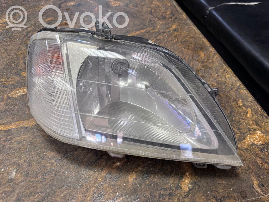 Dacia Logan I Phare frontale 