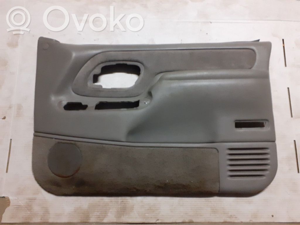 Front door card panel trim