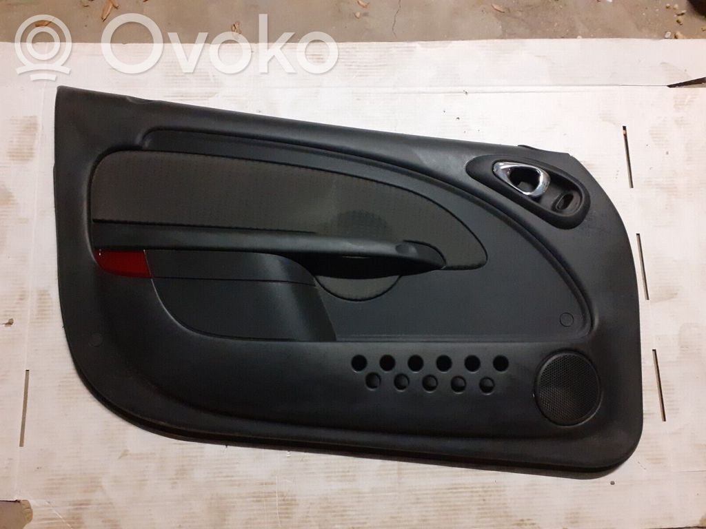 Front door card panel trim