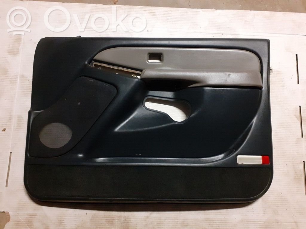 Front door card panel trim