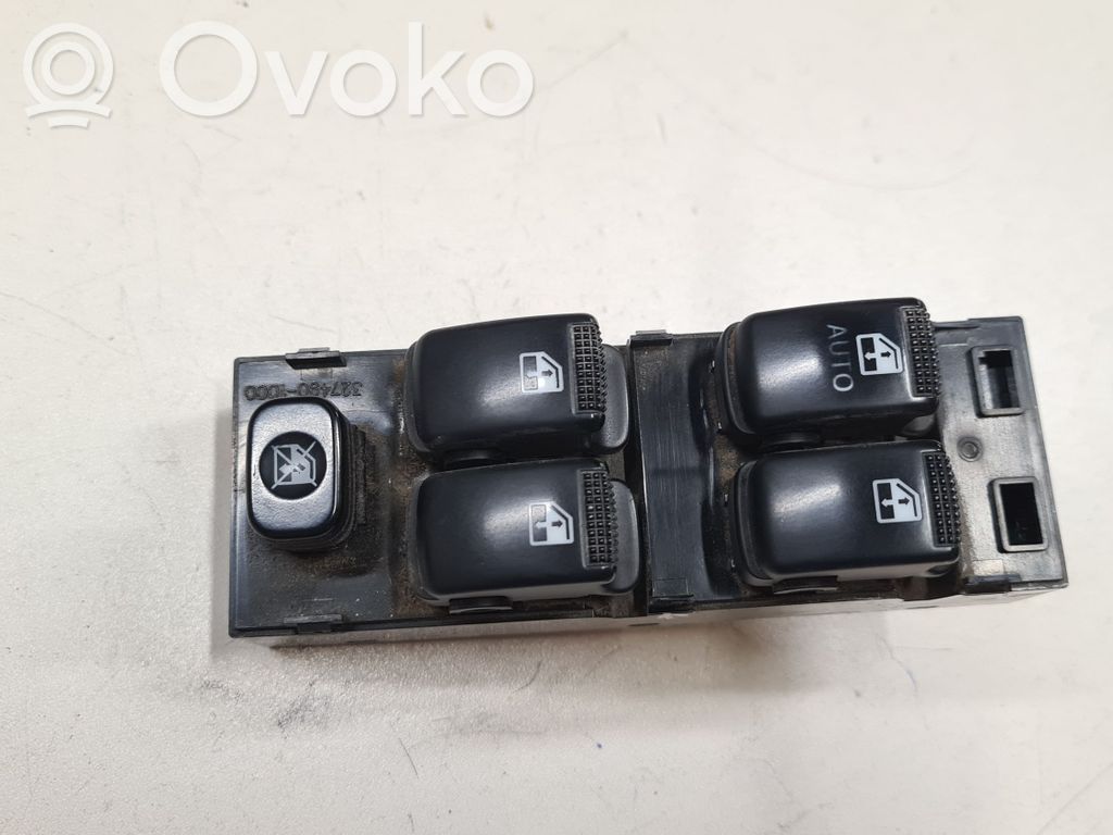 KIA Carens I Electric window control switch 