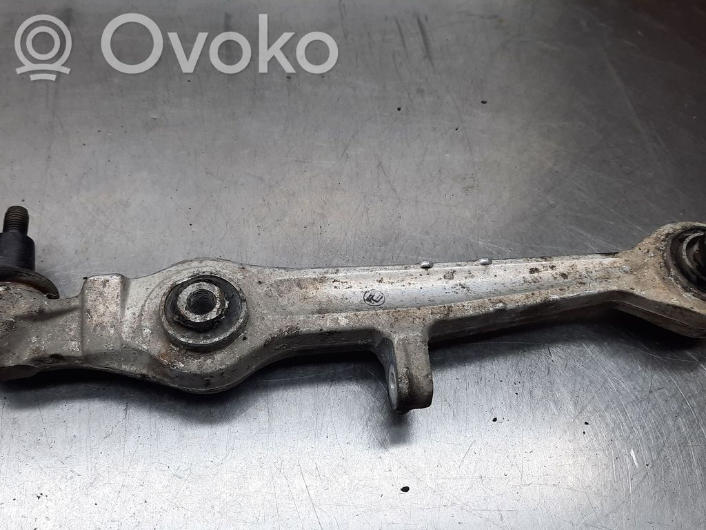 Volkswagen PASSAT B5 Braccio di controllo sospensione anteriore 