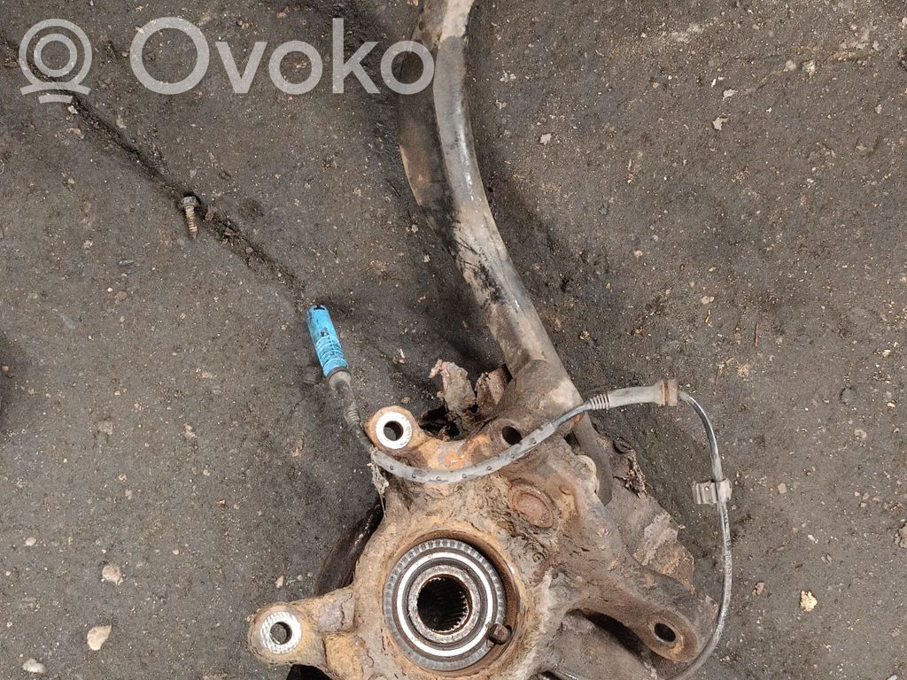 Front wheel hub spindle knuckle