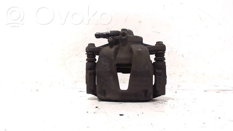 Opel Corsa D Caliper de freno delantero 