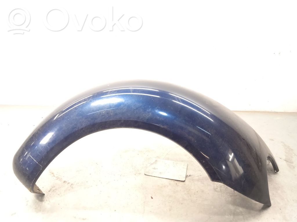 Volkswagen New Beetle Takalokasuojan reuna 