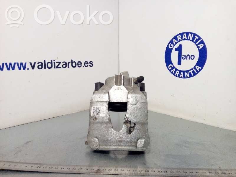 Volkswagen Polo VI Zacisk hamulcowy przedni