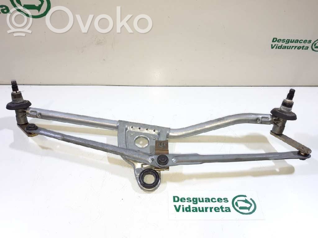 Front wiper blade arm
