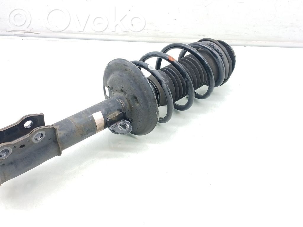 Toyota Yaris Amortyzator osi przedniej ze sprężyną 