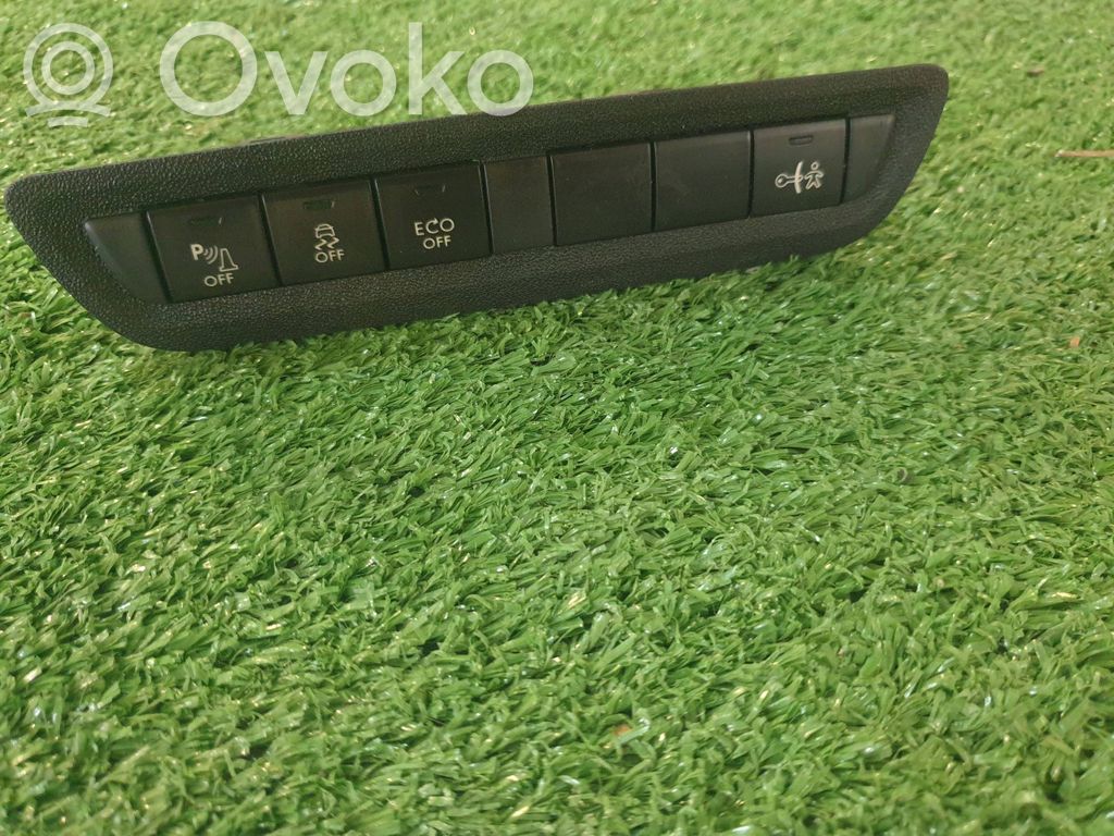 Peugeot 2008 I Un conjunto de interruptores 