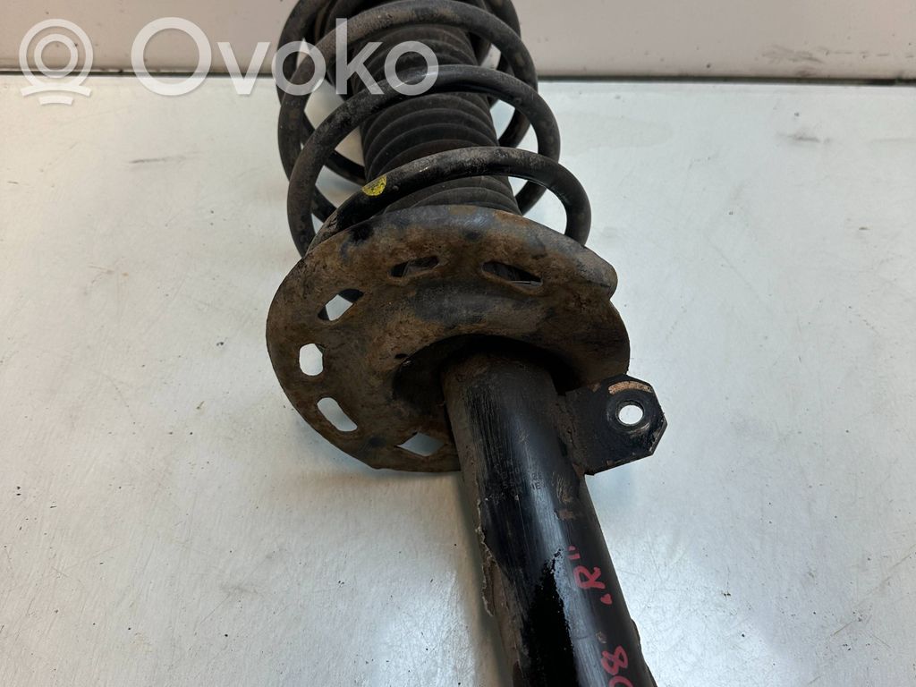 Peugeot 208 I Front shock absorber with coil spring 