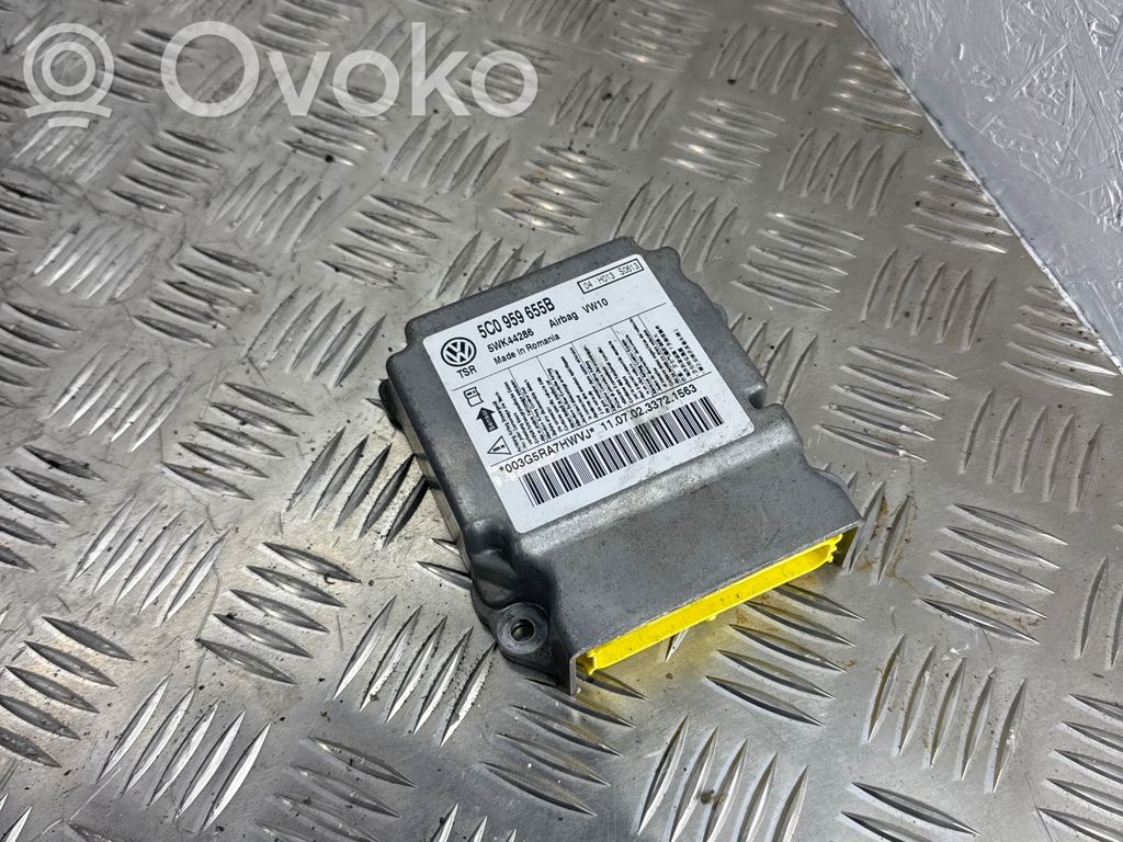 Volkswagen Golf VI Airbag control unit/module 