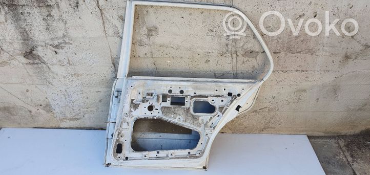 BMW 3 E30 Portiera posteriore 41528106936