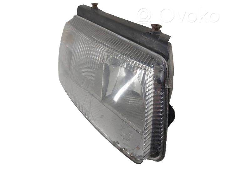 Volkswagen PASSAT B5 Lampa przednia 064411125R