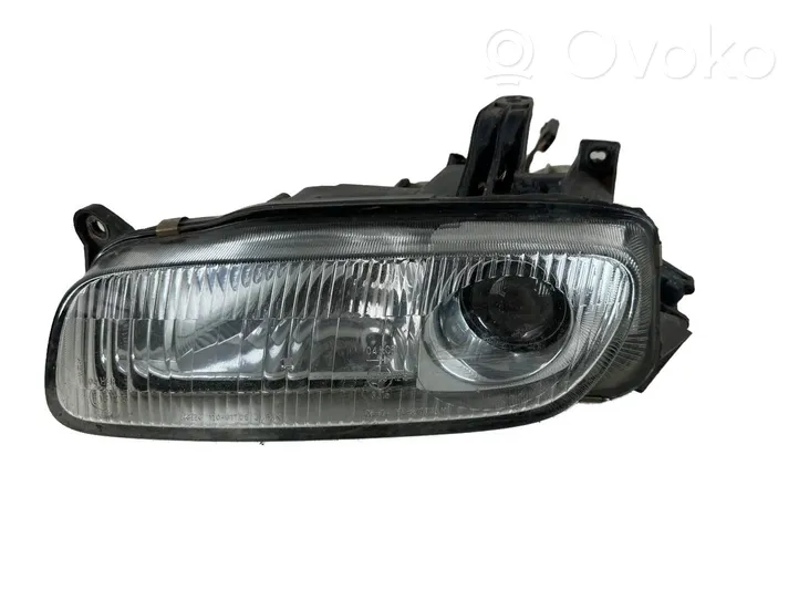 Mazda 323 F Faro/fanale 11061708