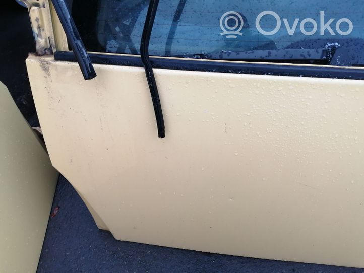 Volkswagen New Beetle Ovi (2-ovinen coupe) 