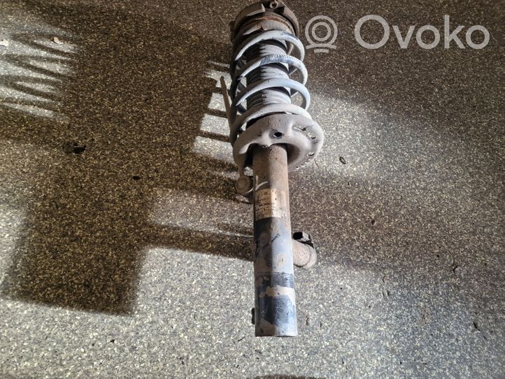 Volkswagen PASSAT CC Front shock absorber with coil spring 