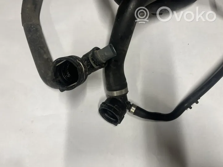 Volkswagen Jetta VII Tuyau de liquide de refroidissement moteur 5QM121049E