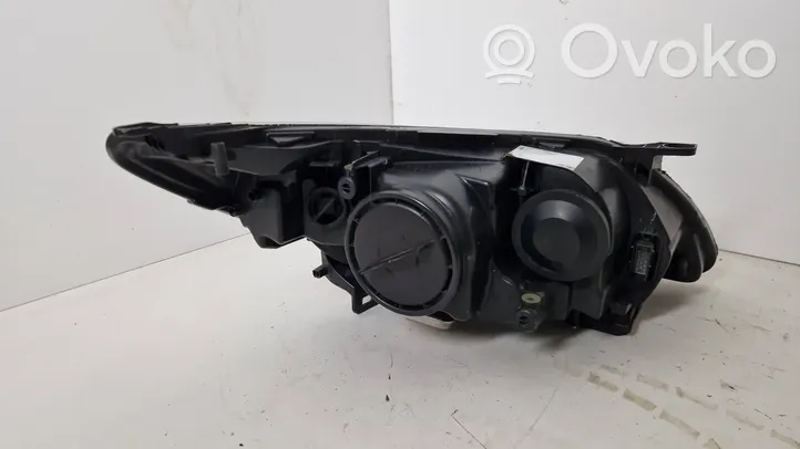 Saab 9-3 Ver2 Lampa przednia 12842053