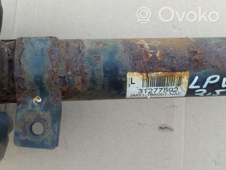 Volvo V50 Front shock absorber with coil spring 31277592