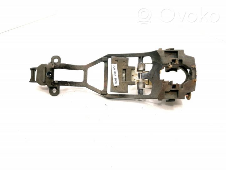 Volkswagen Touareg I Support poignée extérieur de porte avant 7L0837885