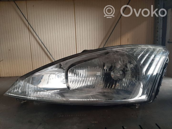 Ford Focus Lampa przednia 12V6055