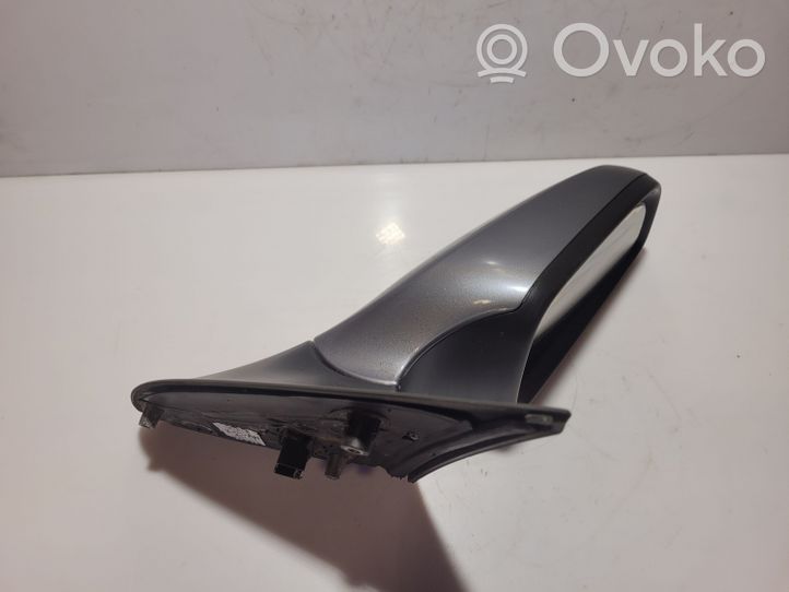 Opel Astra H Elektryczne lusterko boczne drzwi przednich 24462996