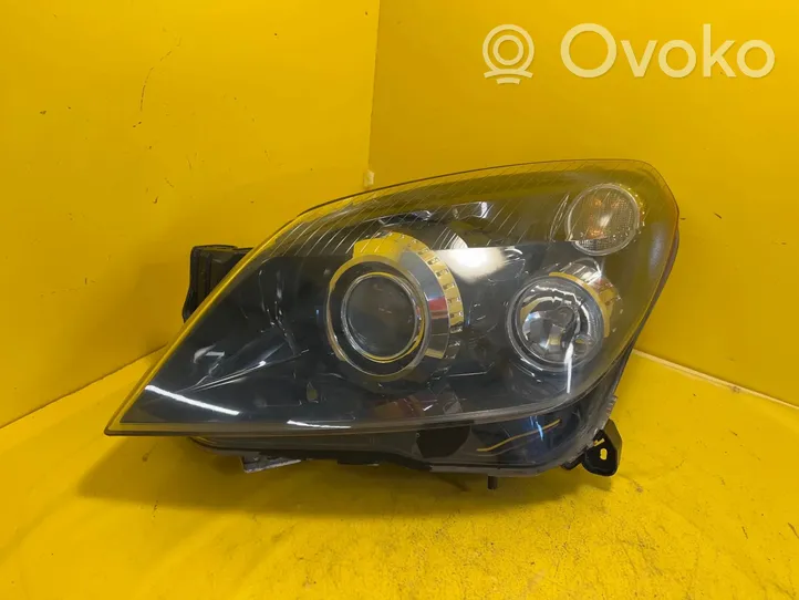 Opel Astra H Lampa przednia 5498745962