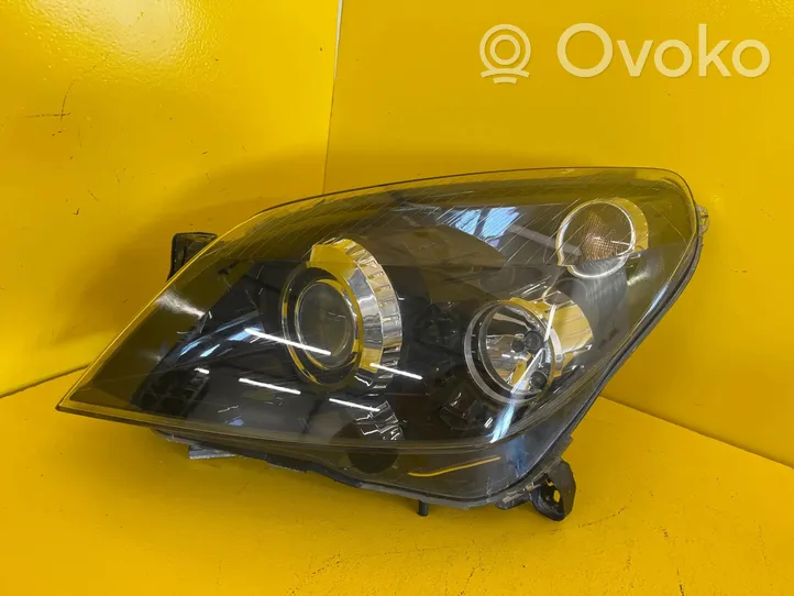 Opel Astra H Lampa przednia 5498745962