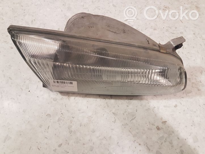 Toyota Camry Lampa przednia 11076448