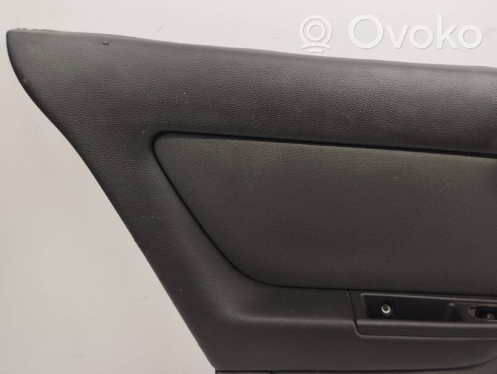 Opel Astra G Rivestimento del pannello della portiera posteriore 013112799