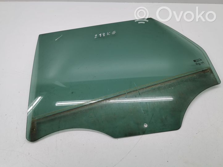 Opel Astra J Rear door window glass 