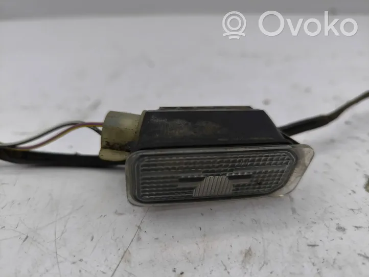 Ford Grand C-MAX Lampa oświetlenia tylnej tablicy rejestracyjnej AM5110E998