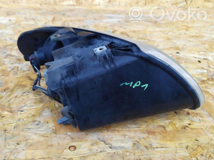 Dodge Caravan Lampa przednia 04857701ab