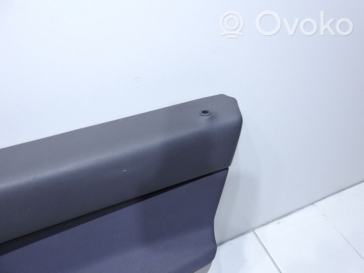 Volvo V50 Garniture de panneau carte de porte avant 39877634