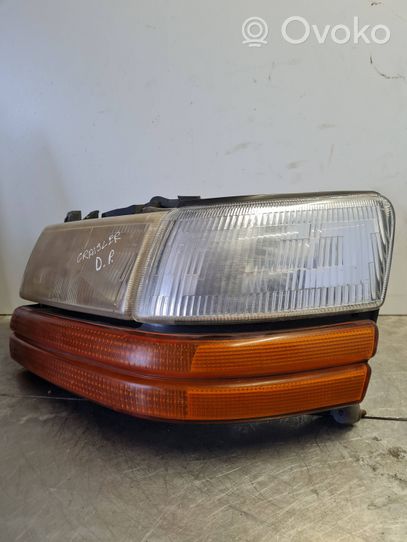 Chrysler Voyager Lampa przednia 46536B