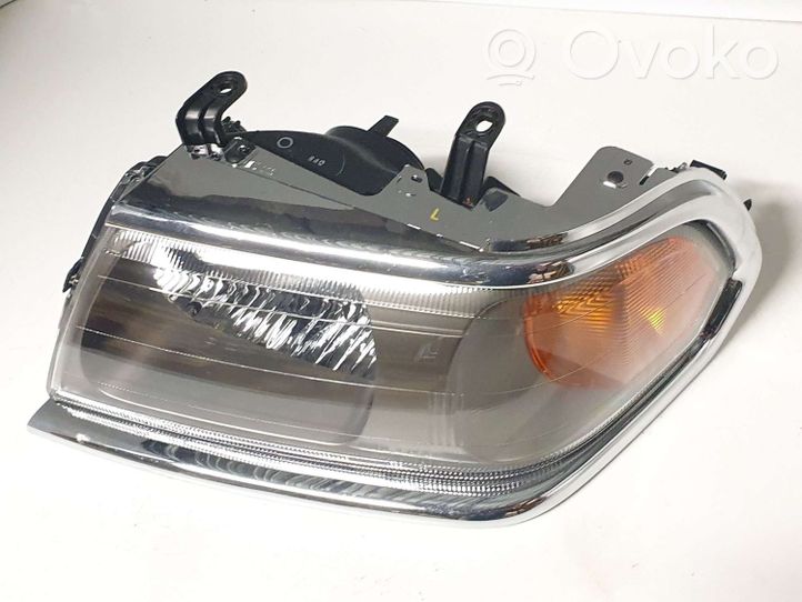 Mitsubishi Pajero Sport I Lampa przednia 