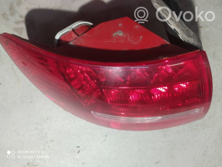 Audi A6 Allroad C6 Lampy tylnej klapy bagażnika 89094149